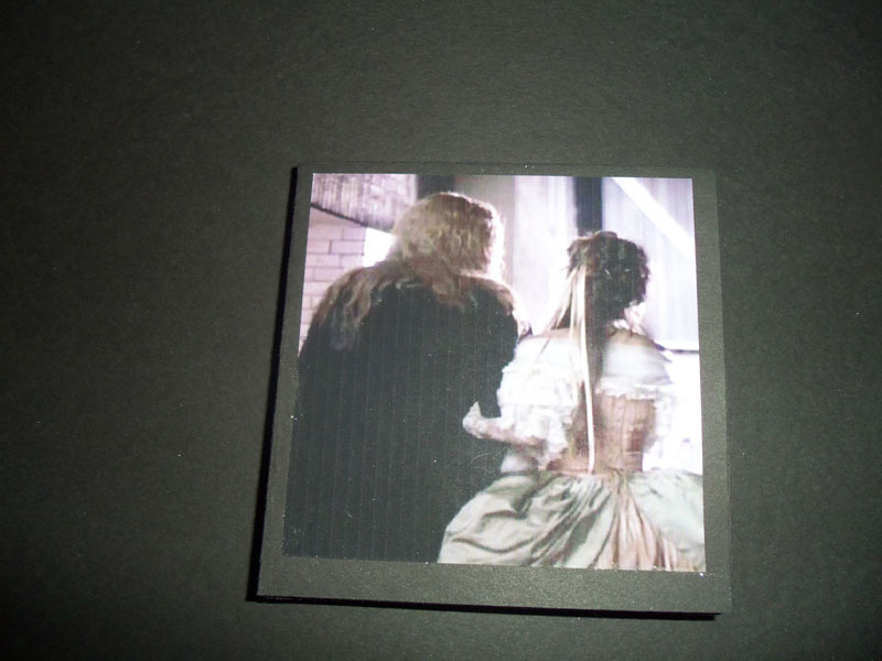 Back cover. Vincent and Catherine walking away together
