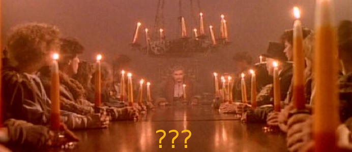 Folks below at the Winterfest table; 3 questions marks