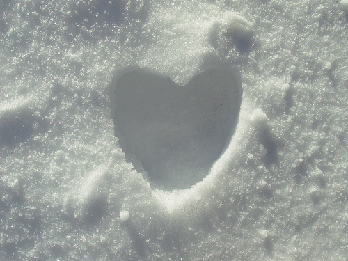 A heart-shaped indentation in the snow. 