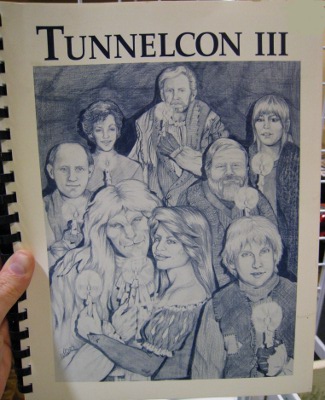 text top: Tunnelcon III; image is a pencil drawingof a group of tunnel folk, all holding lit candles, back to front, left to right: Father, Laura, Jamie, Pascal, William, Vincent, Catherine, Mouse